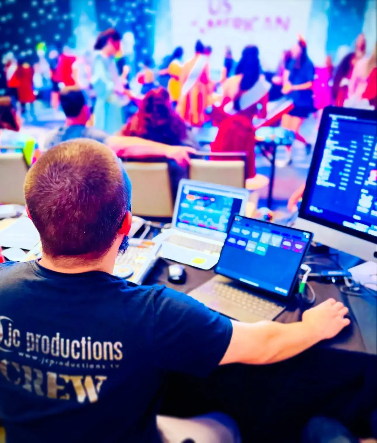 Production operator monitoring screens during a live event